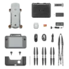 Drone kit components laid out, including the drone, controller, propellers, charger, cables, and carrying case.